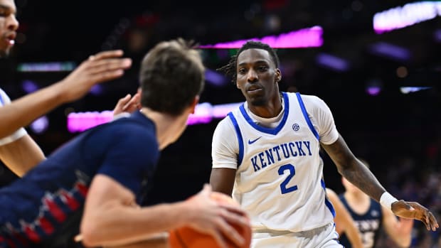 Dec 9, 2023; Philadelphia, Pennsylvania, USA; Kentucky Wildcats forward Aaron Bradshaw (2) defends Penn Quakers guard Clark Slajchert (0) in the first half at Wells Fargo Center. Mandatory Credit: Kyle Ross-USA TODAY Sports